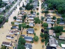 Tropical storm Henri makes landfall in Rhode Island as Biden deploys Fema to combat risk of major flooding