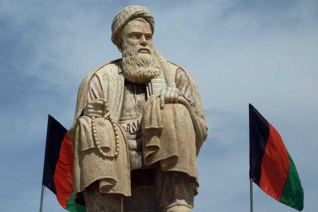 <p>A statue of Abdul Ali Mazari, leader of the Hazara, in Bamiyan valley in Afghanistan</p>