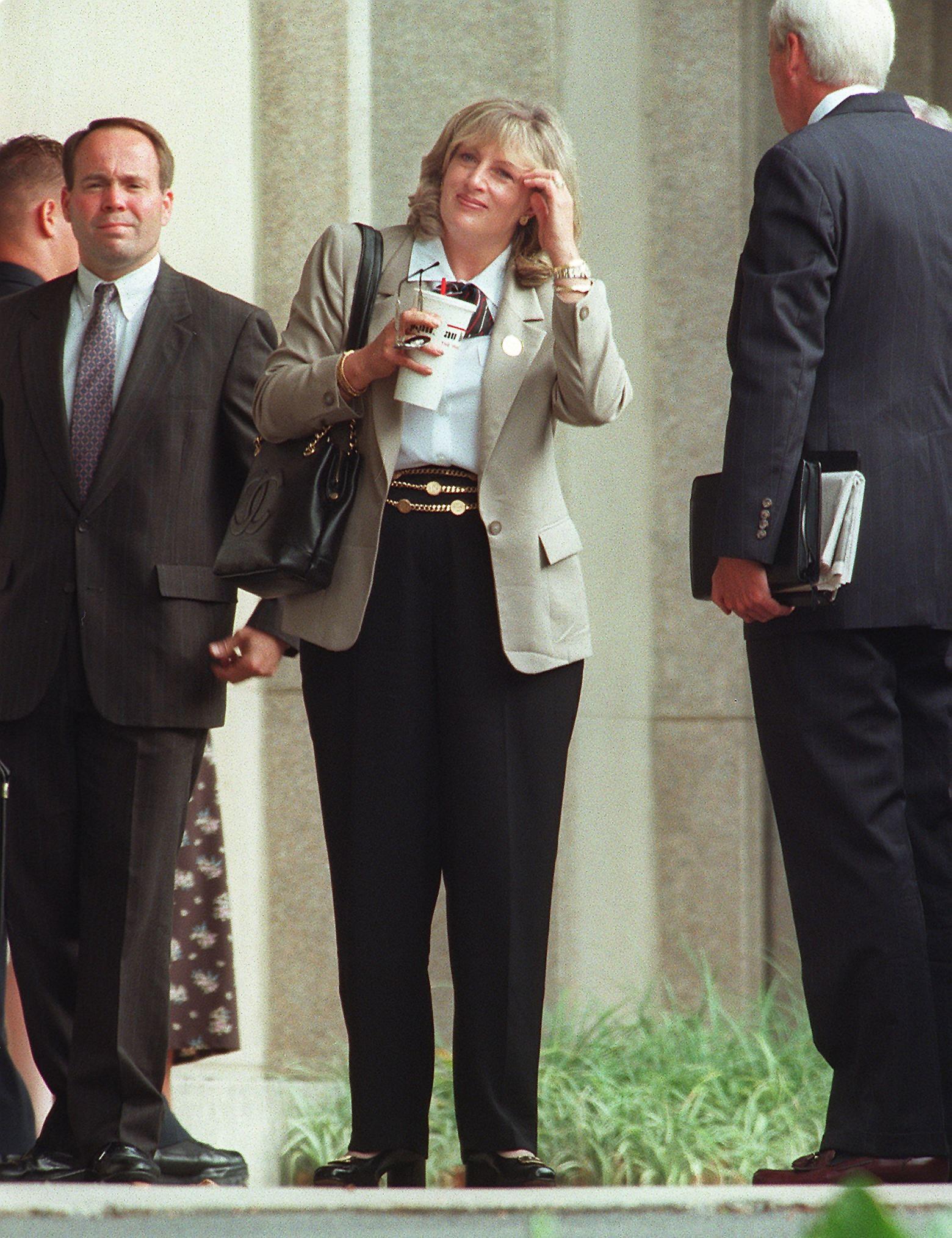 Linda Tripp, who secretly taped conversations with Monica Lewinsky, arrives on 9 July 1998 at the US District Courthouse in Washington, DC