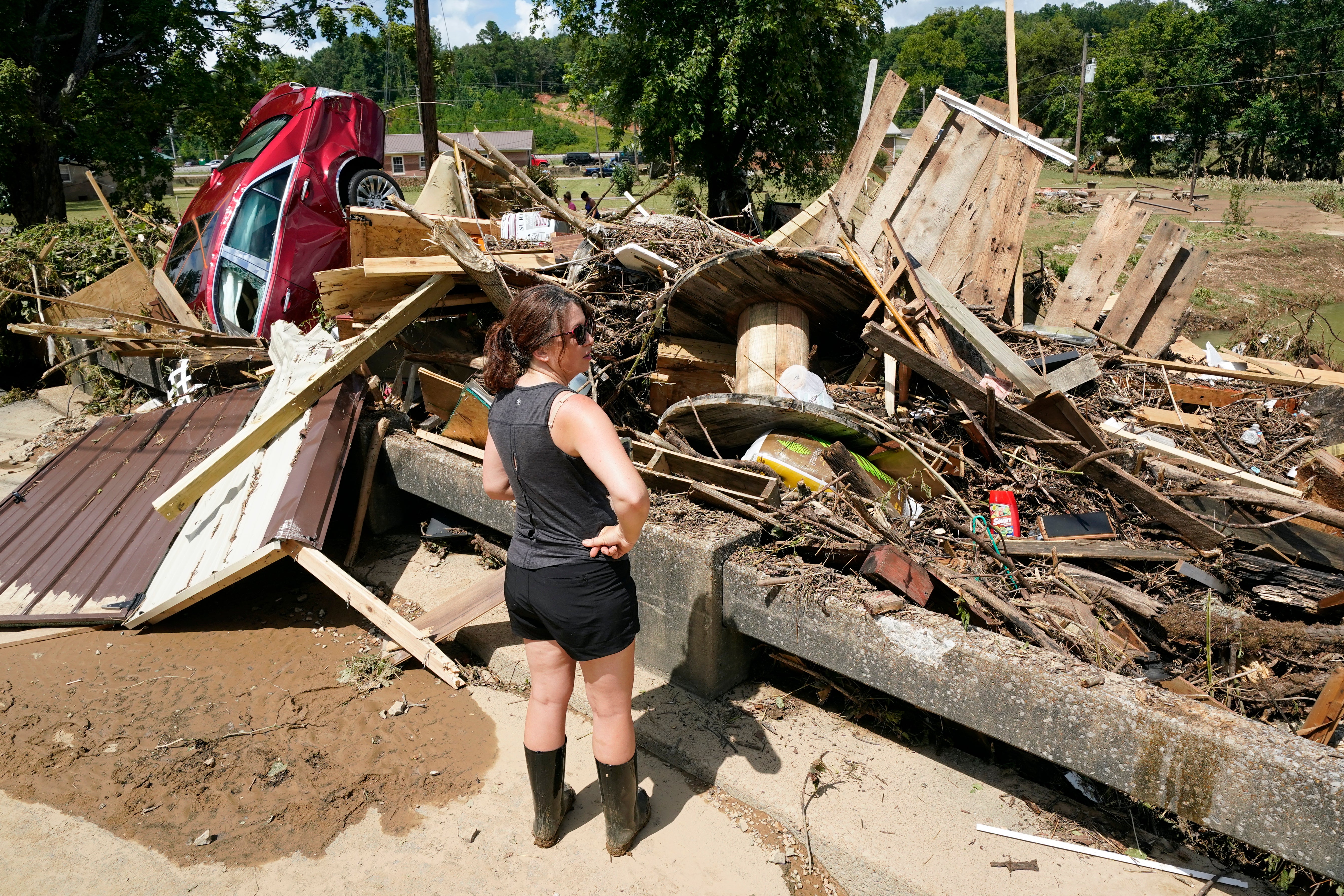 Survivors survey the damage in Tennessee after historic floods devastated the state