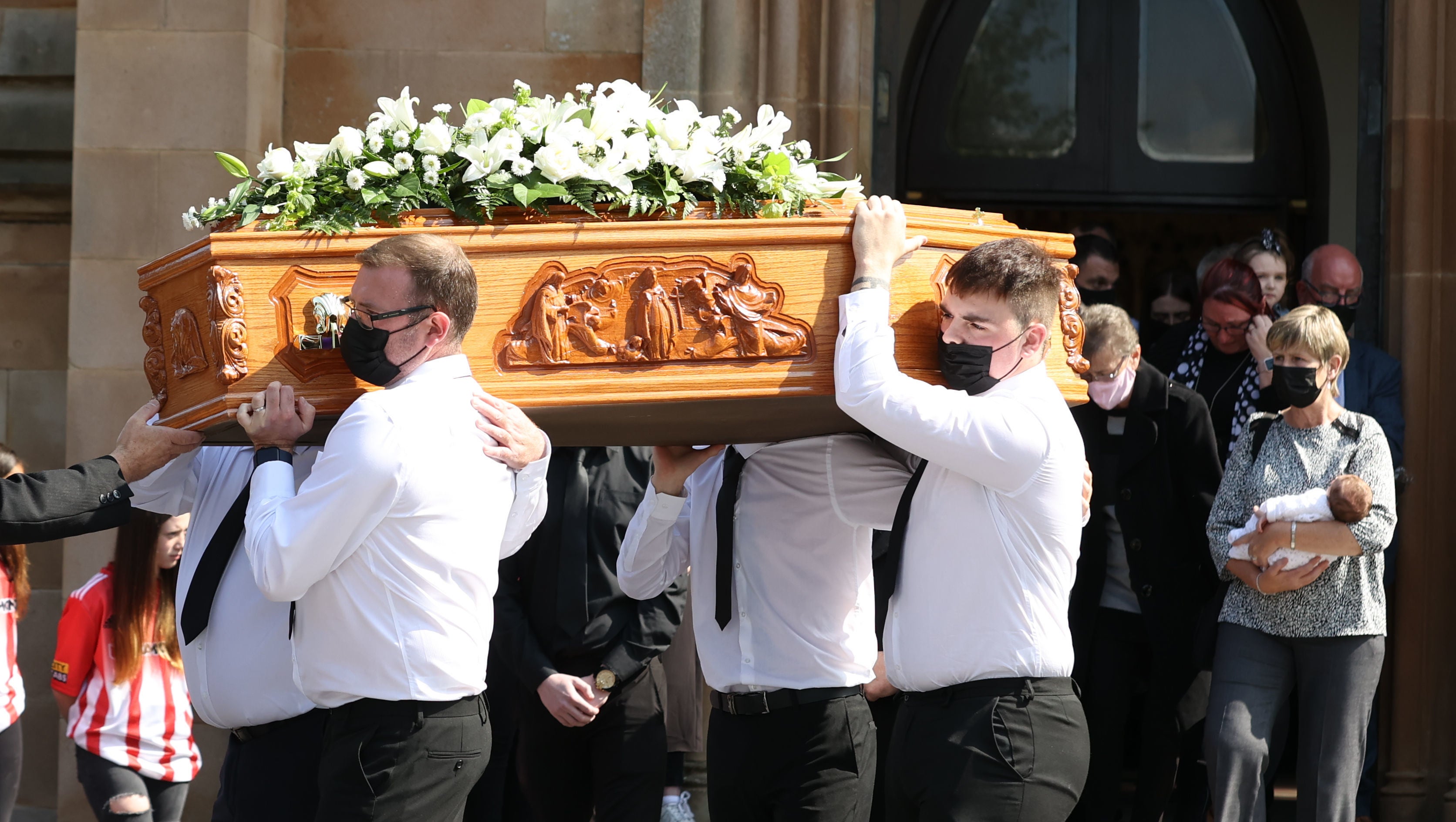 The coffin of Samantha William is taken from St Columb’s Church, Londonderry, after her funeral
