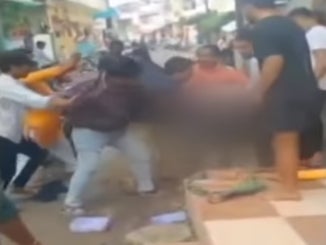 A screenshot of the video going viral on social media, where a Muslim bangle seller was thrashed by a mob