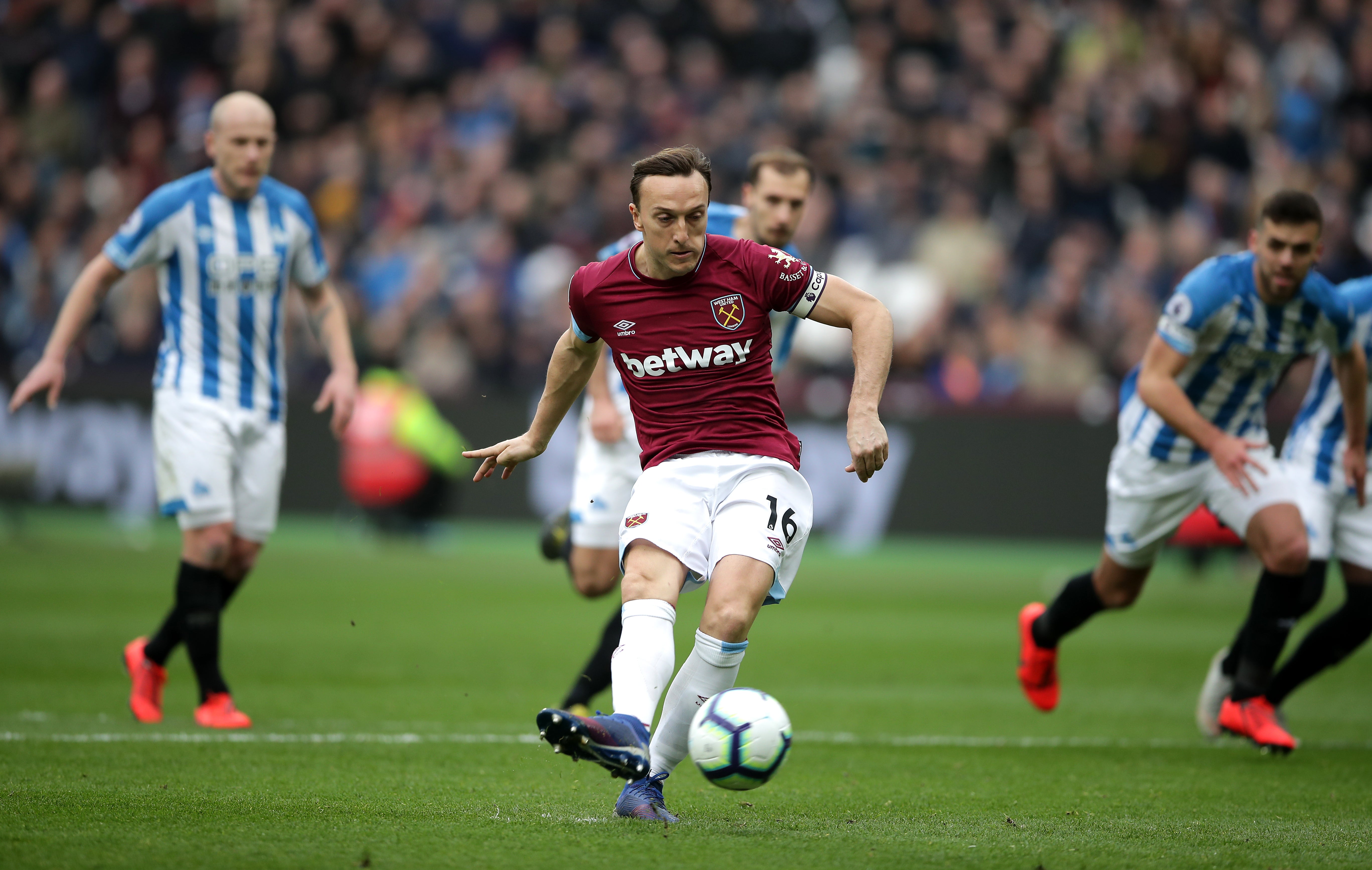 Mark Noble slots away another penalty (John Walton/PA)