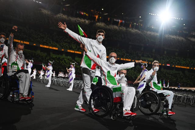 <p>Teams arriving for the opening ceremony for the Tokyo 2020 Paralympic Games at the Olympic Stadium in Tokyo on 24 August</p>