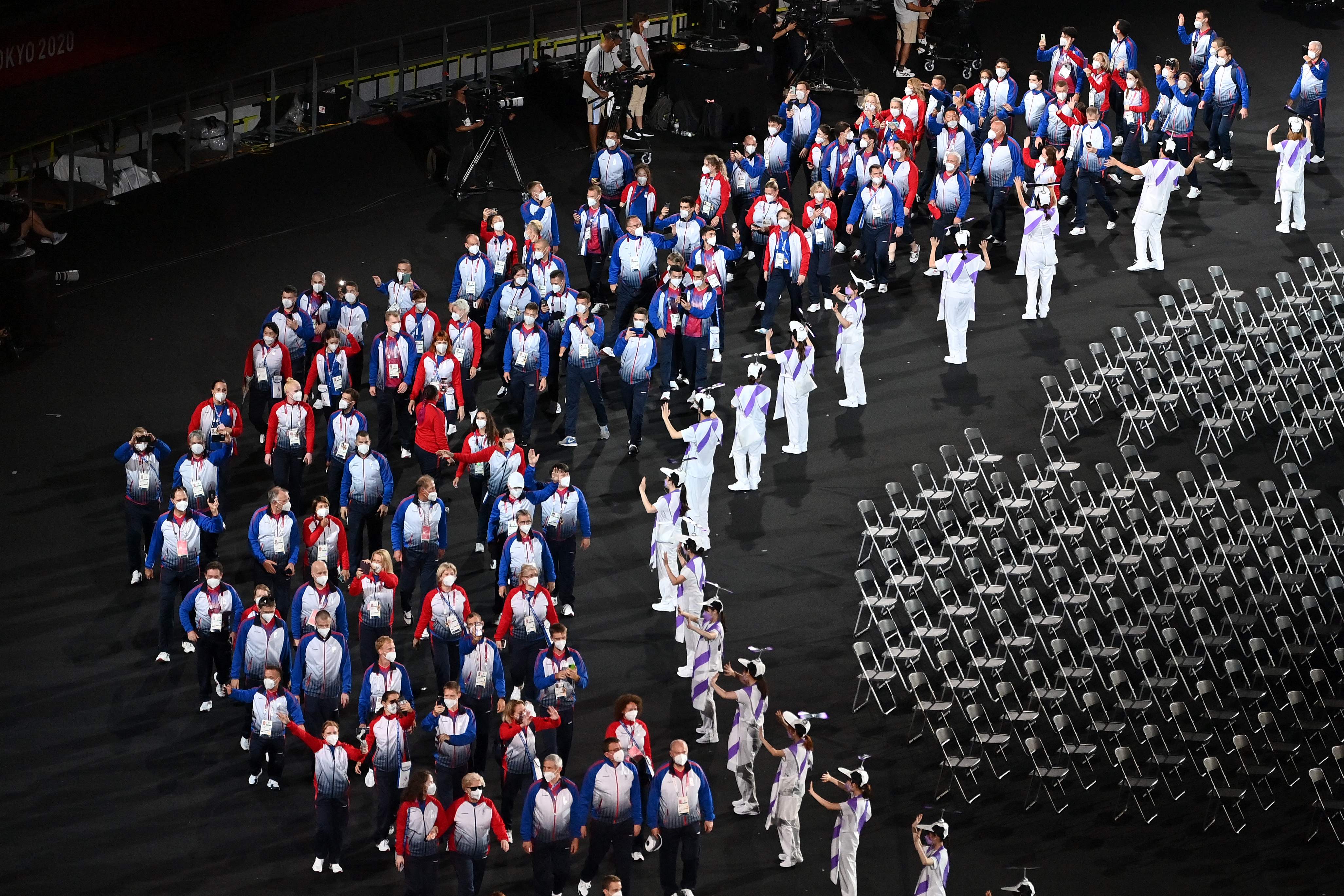 Russia's team arrive during the opening ceremony for the Tokyo 2020 Paralympic Games