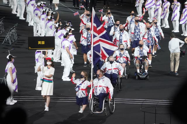 <p>Ellie Simmonds and John Stubbs carried the flag for Great Britain </p>