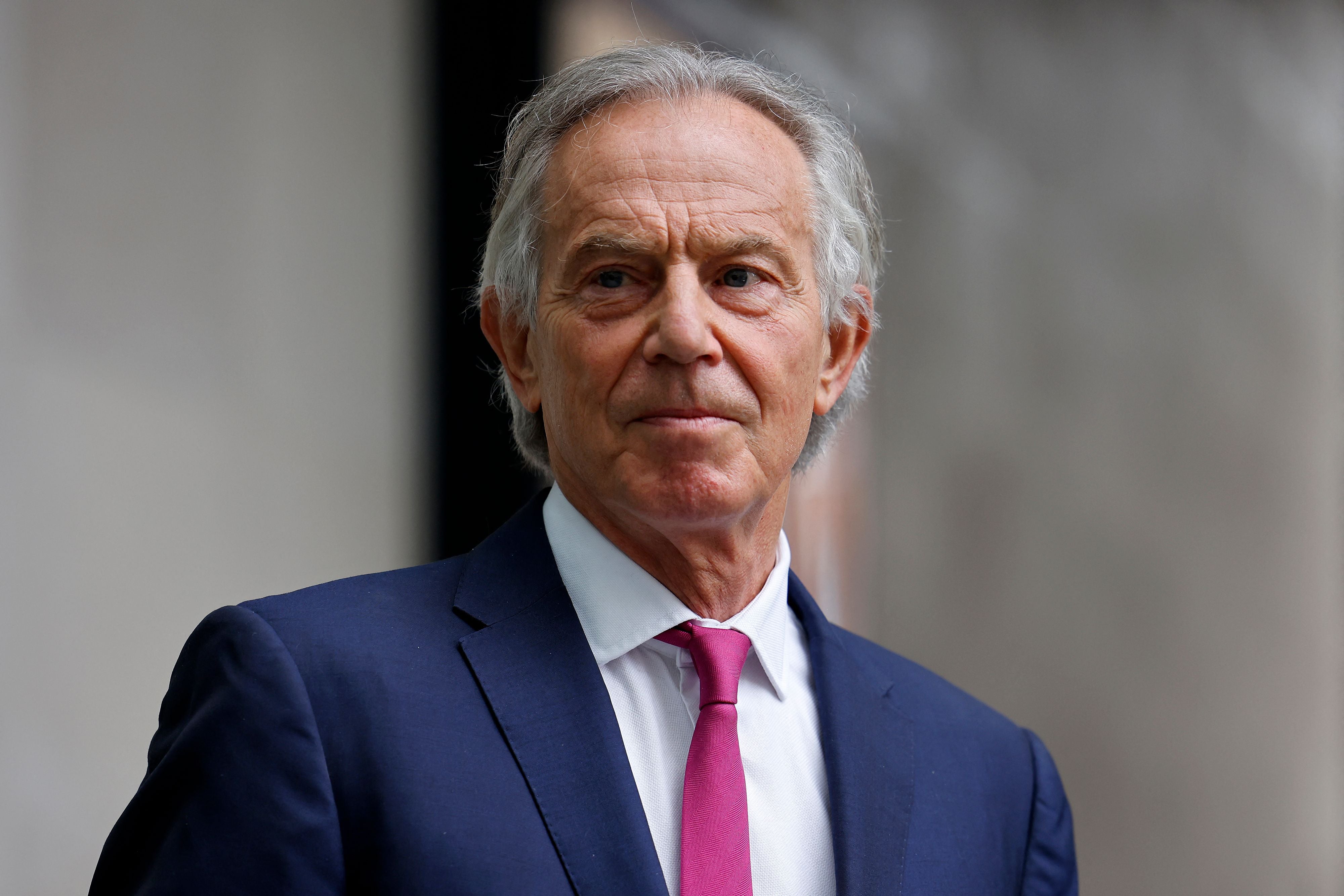 Former British Prime Minister Tony Blair, wearing a face covering due to Covid-19, leaves the BBC in central London on June 6, 2021, after appearing on the BBC political programme The Andrew Marr Show