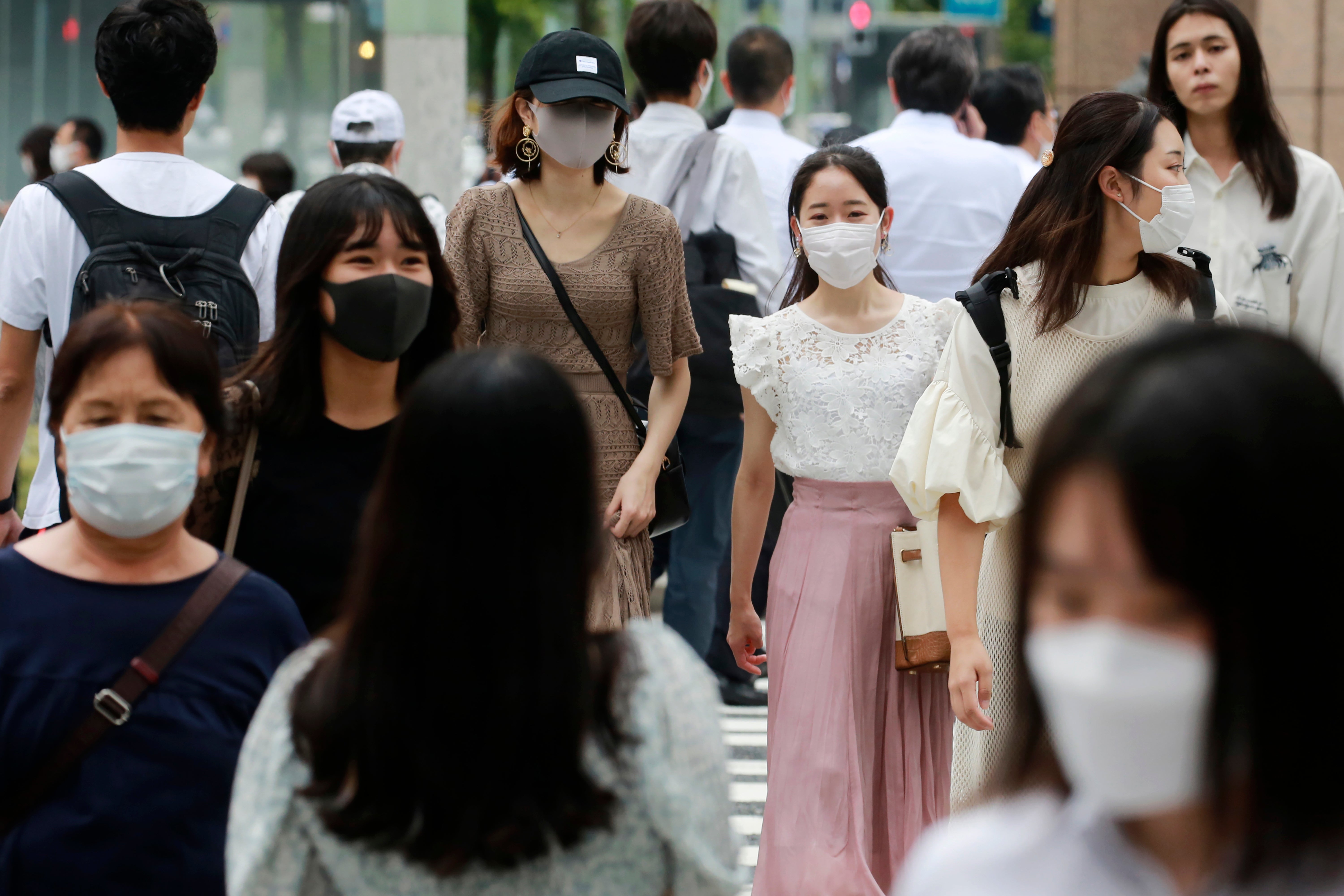 File: Daily Covid-19 infections have surged by at least 10 times since last month to 25,000 cases across Japan, with 5,000 cases reported from Tokyo