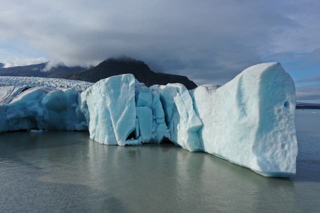 <p>File: Pieces of the melting face of Fjallsjokull glacier jut into a lake of the glacier’s own meltwater on 14 August 2021 near Hof, Iceland</p>