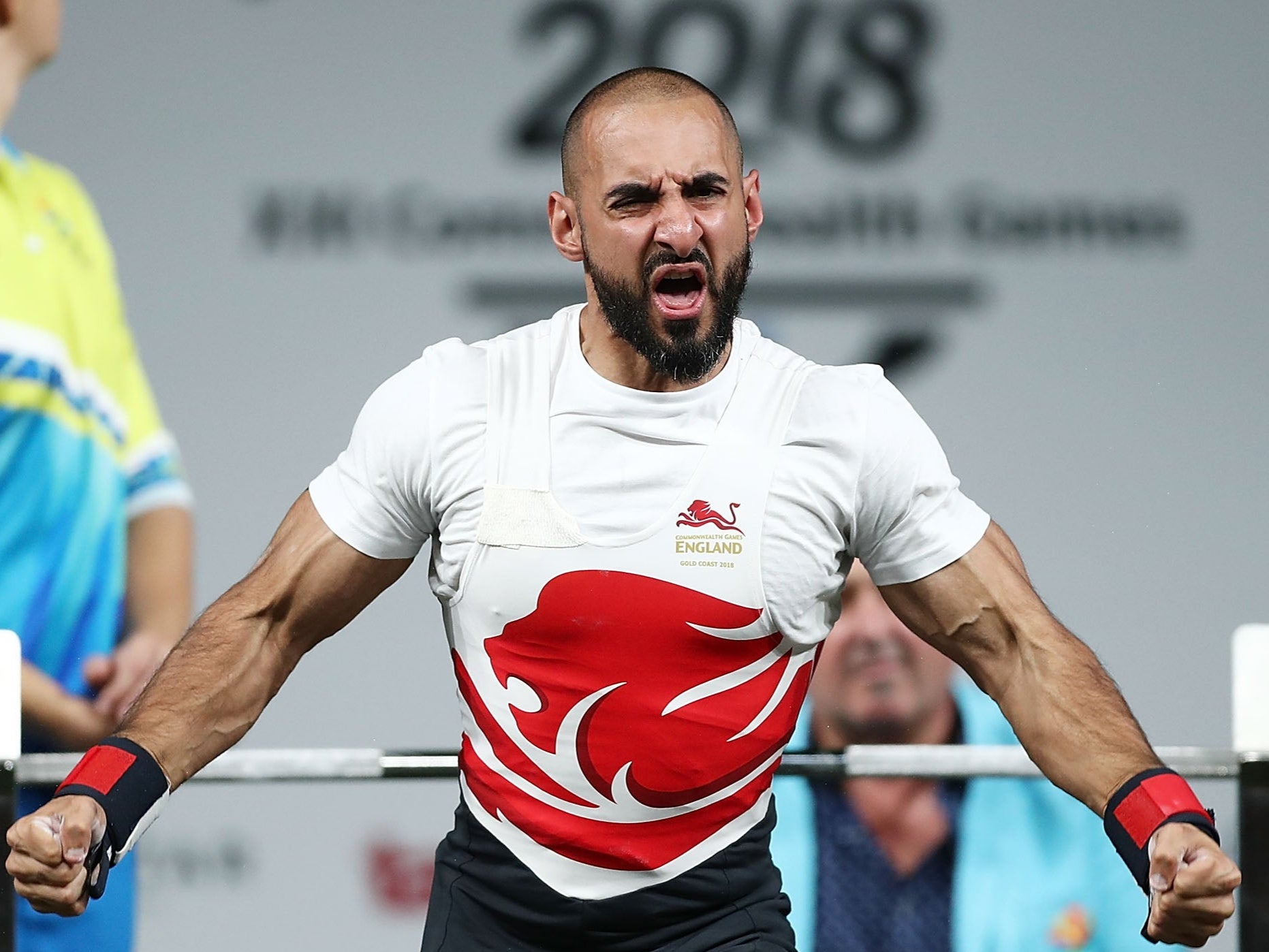 Ali Jawad of England celebrates a lift in the Men’s Lightweight Final during the Para Powerlifting on day six of the Gold Coast 2018 Commonwealth Games