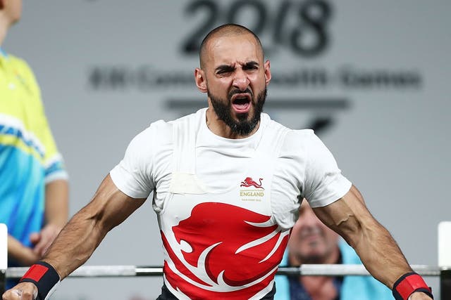 <p>Ali Jawad of England celebrates a lift in the Men’s Lightweight Final during the Para Powerlifting on day six of the Gold Coast 2018 Commonwealth Games</p>