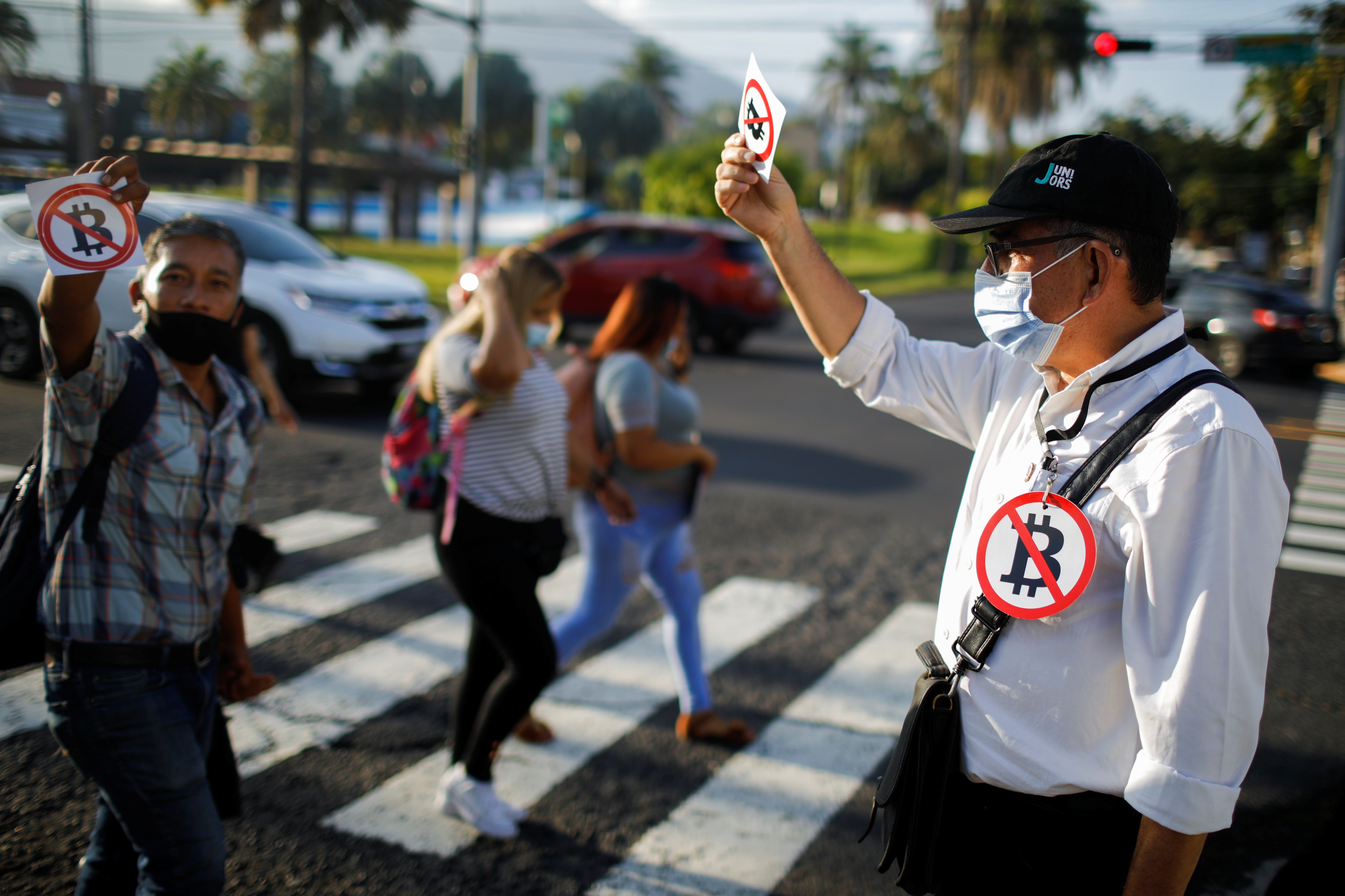 Politician Eugenio Chicas is the main organiser of an anti-bitcoin sticker campaign