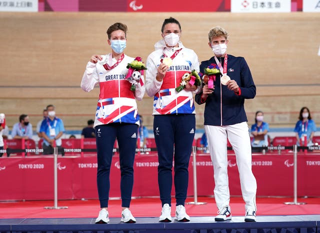 <p>Storey, centre, took her Paralympic tally to 15 gold medals (Tim Goode/PA)</p>