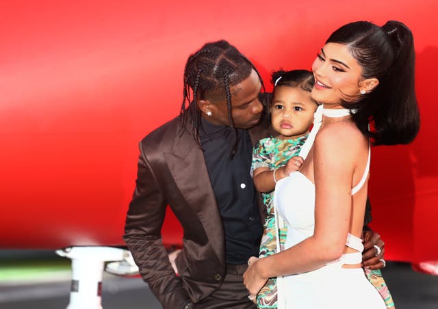 <p>Kylie Jenner and Travis Scott spark mixed reactions after surprising Stormi with school bus</p>