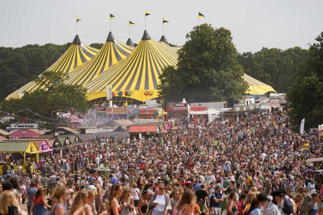 <p>Festival goers at Latitude festival in Henham Park, Suffolk, last month </p>