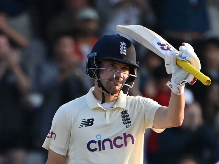 Rory Burns celebrates his half-century