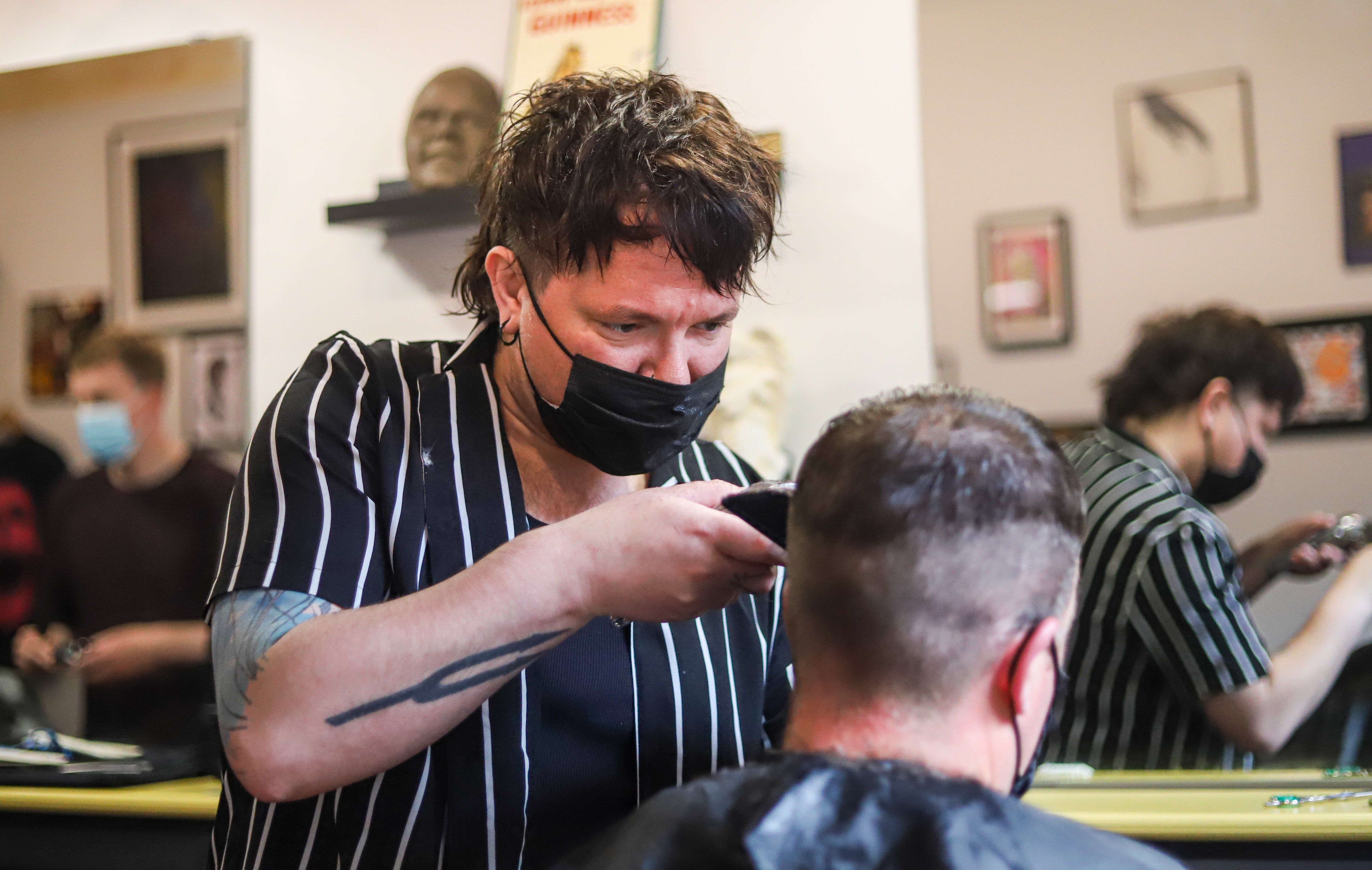Hairdressers and other consumer service businesses might see headcount fall in the next few months (Damien Storan/PA)
