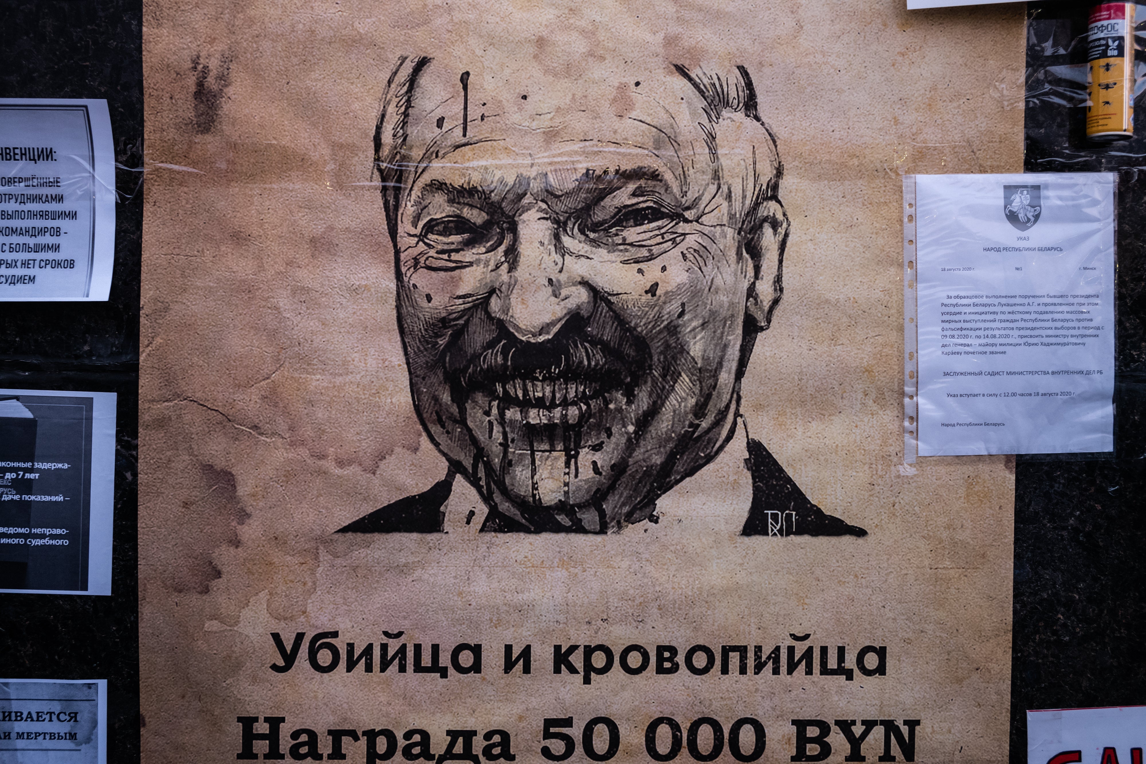 A wanted poster with an image of Lukashenko posted after the disputed presidential election last year