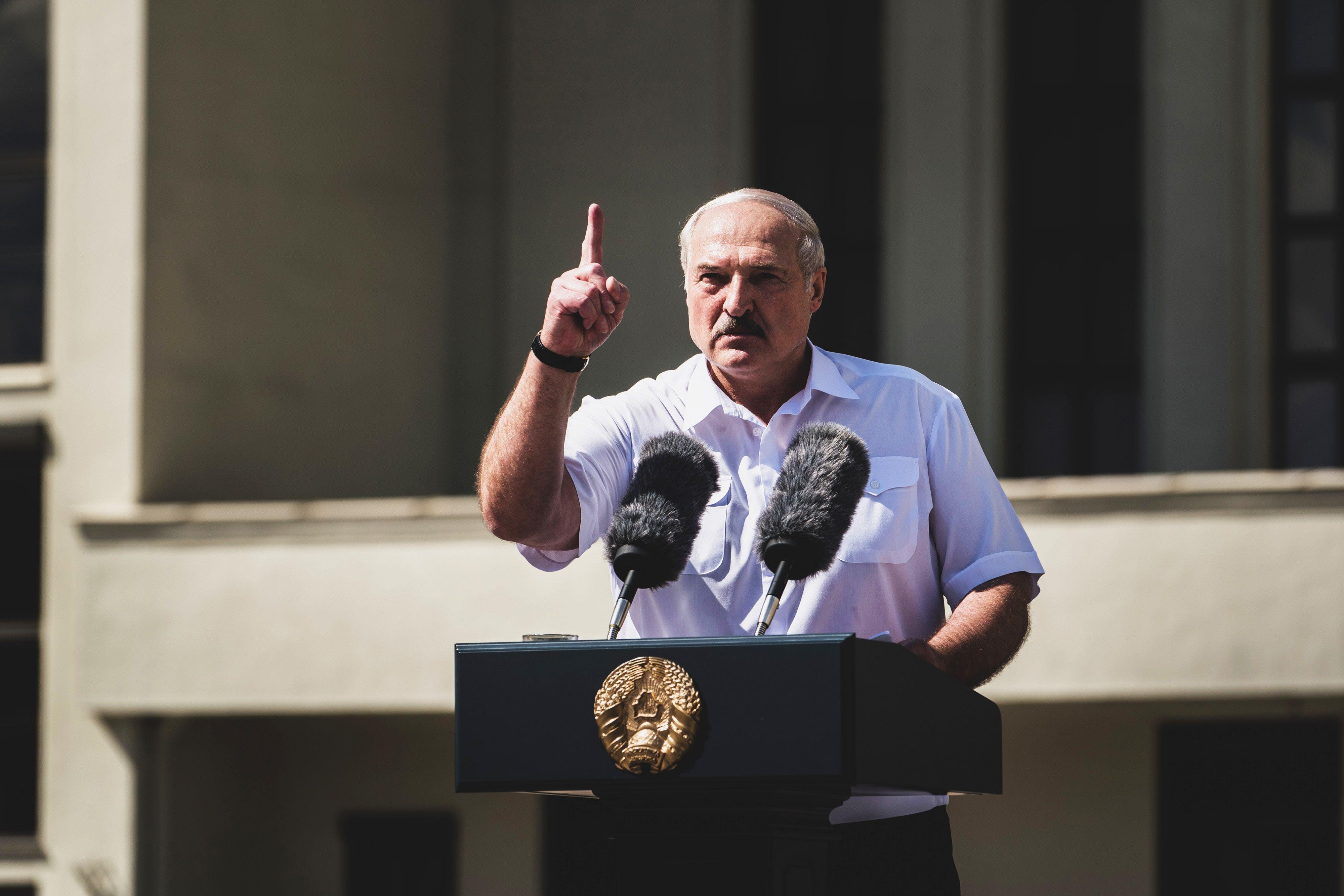 <p>Belarus president Alexander Lukashenko gives a speech during a rally of his supporters last year in Independence Square, Minsk</p>