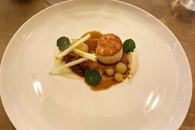 <p>Top dish: The scallops, served with a bacon jam, come from the Orkney islands</p>