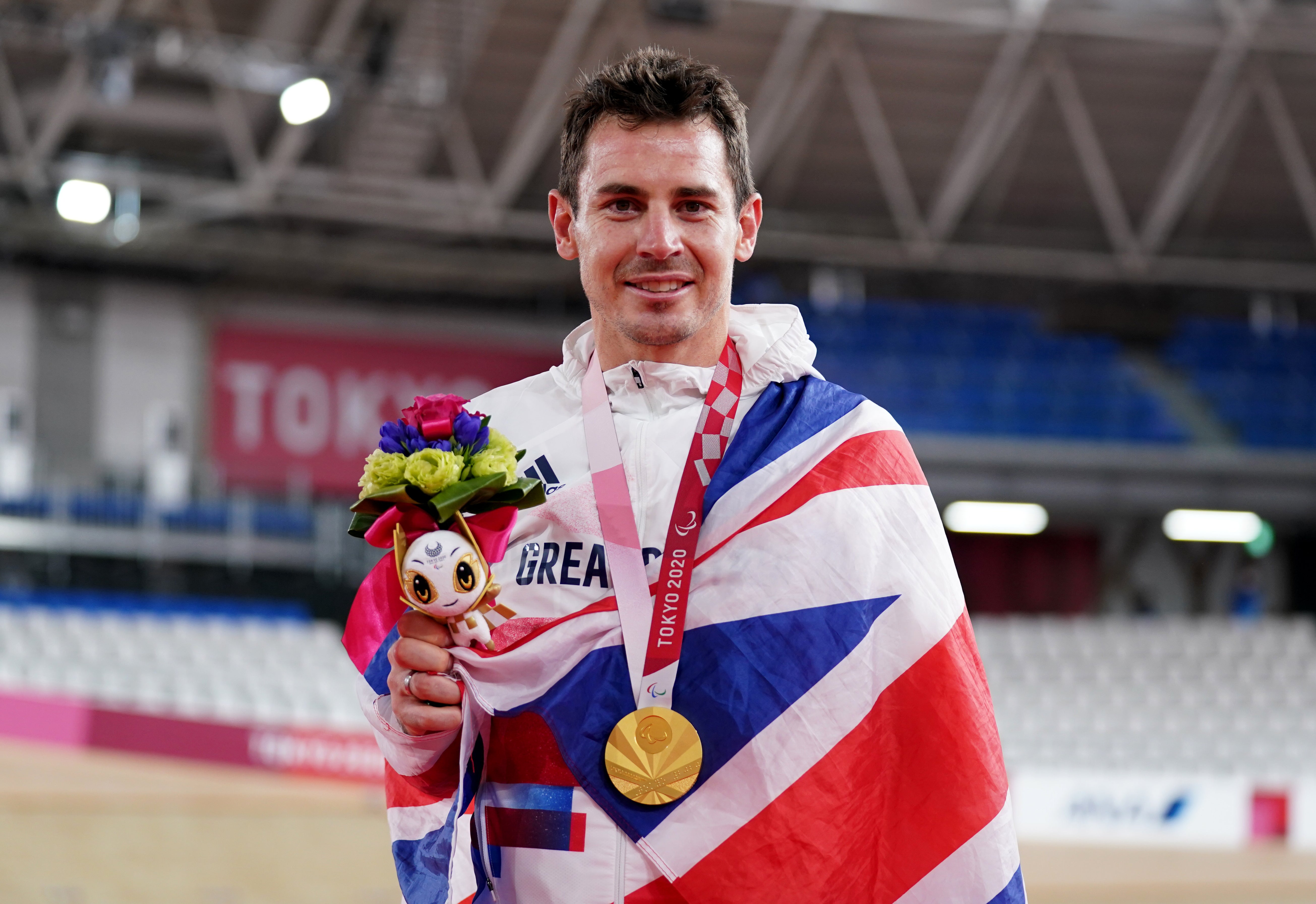Great Britain’s Jaco van Gass celebrates with his gold medal (Tim Goode/PA)