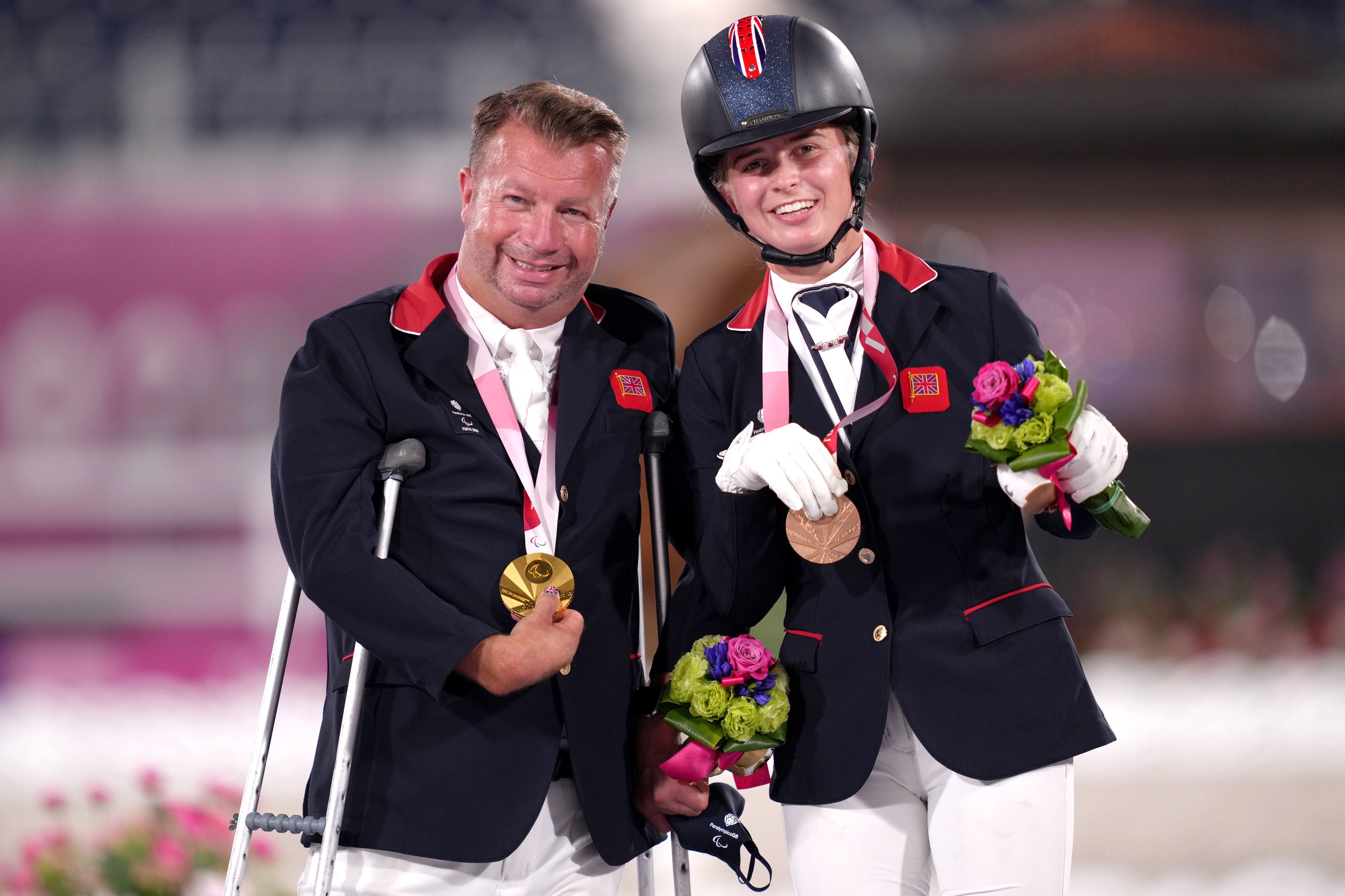 <p>Great Britain’s Lee Pearson (left) poses alongside teammate Georgia Wilson</p>