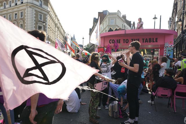 <p>XR protesters block the junction of Long Acre and Upper St Martin’s Lane on 23 August</p>
