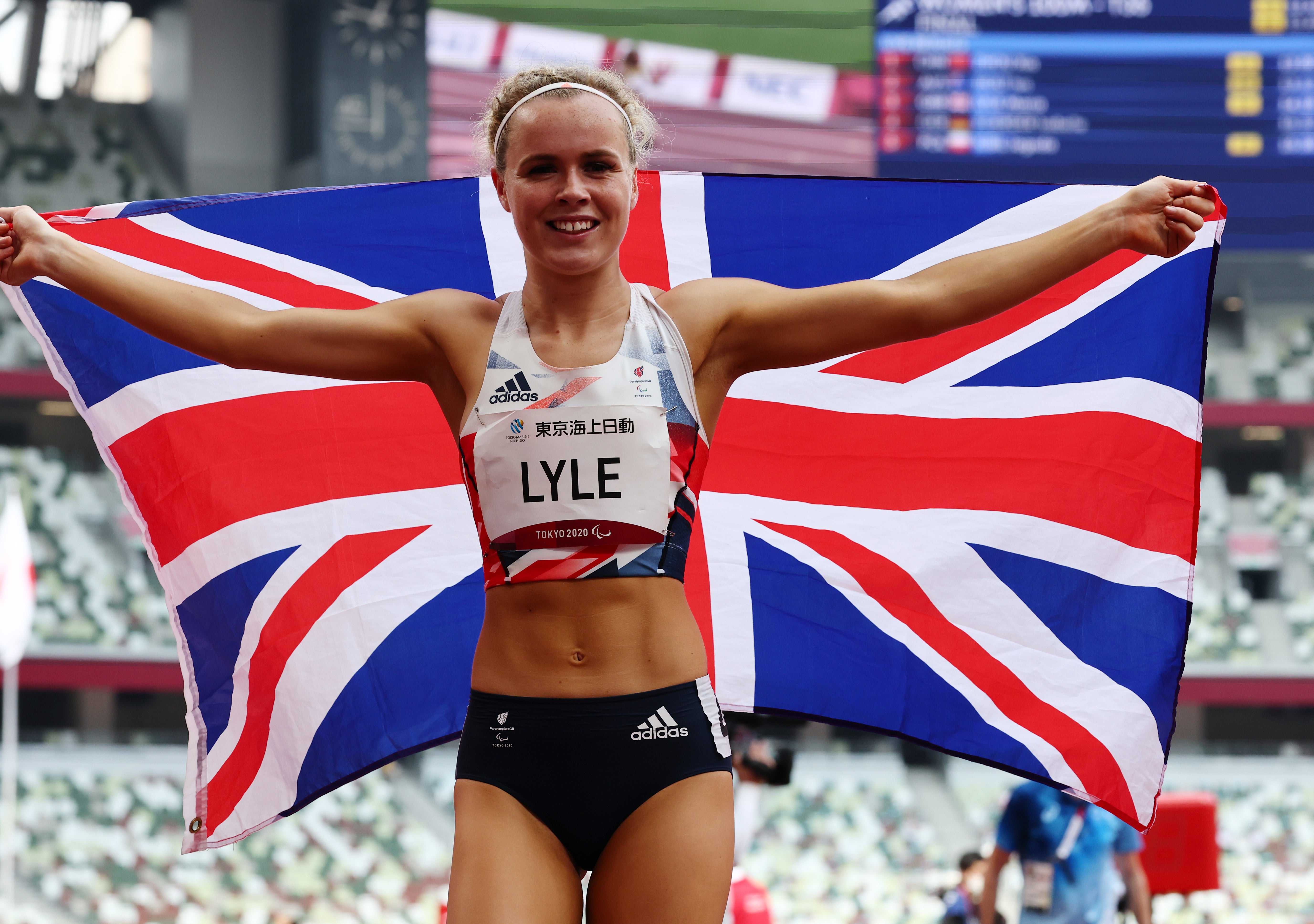 Maria Lyle of Britain celebrates winning bronze in women's 100m