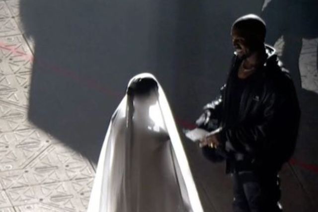 <p>Kanye West recreates wedding scene with Kim Kardashian at Donda event</p>