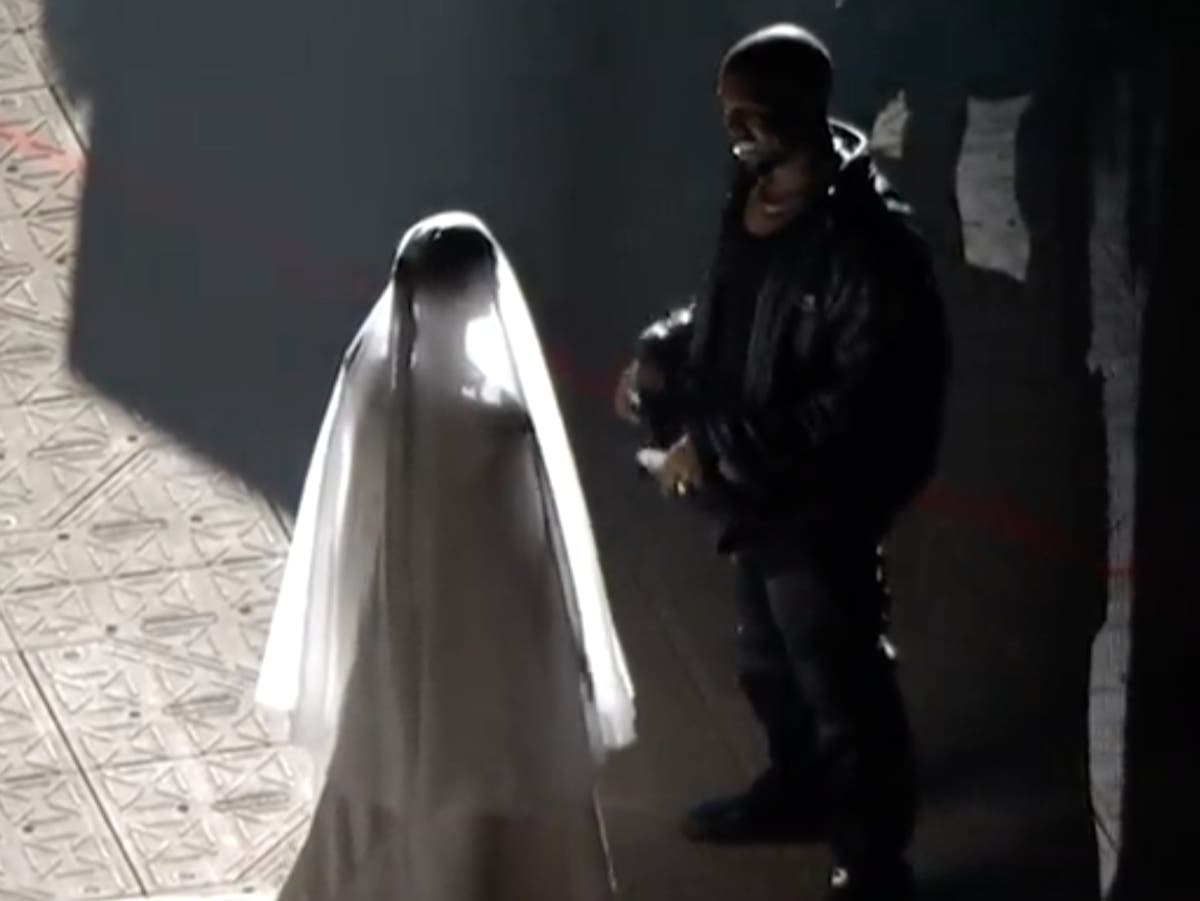 Everything we know about the wedding dress Kim Kardashian wore at Kanye’s Donda event