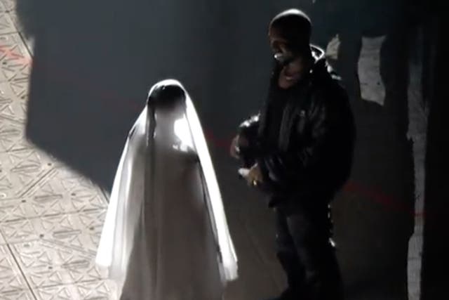 <p>Kim Kardashian and Kanye West at the Donda event</p>
