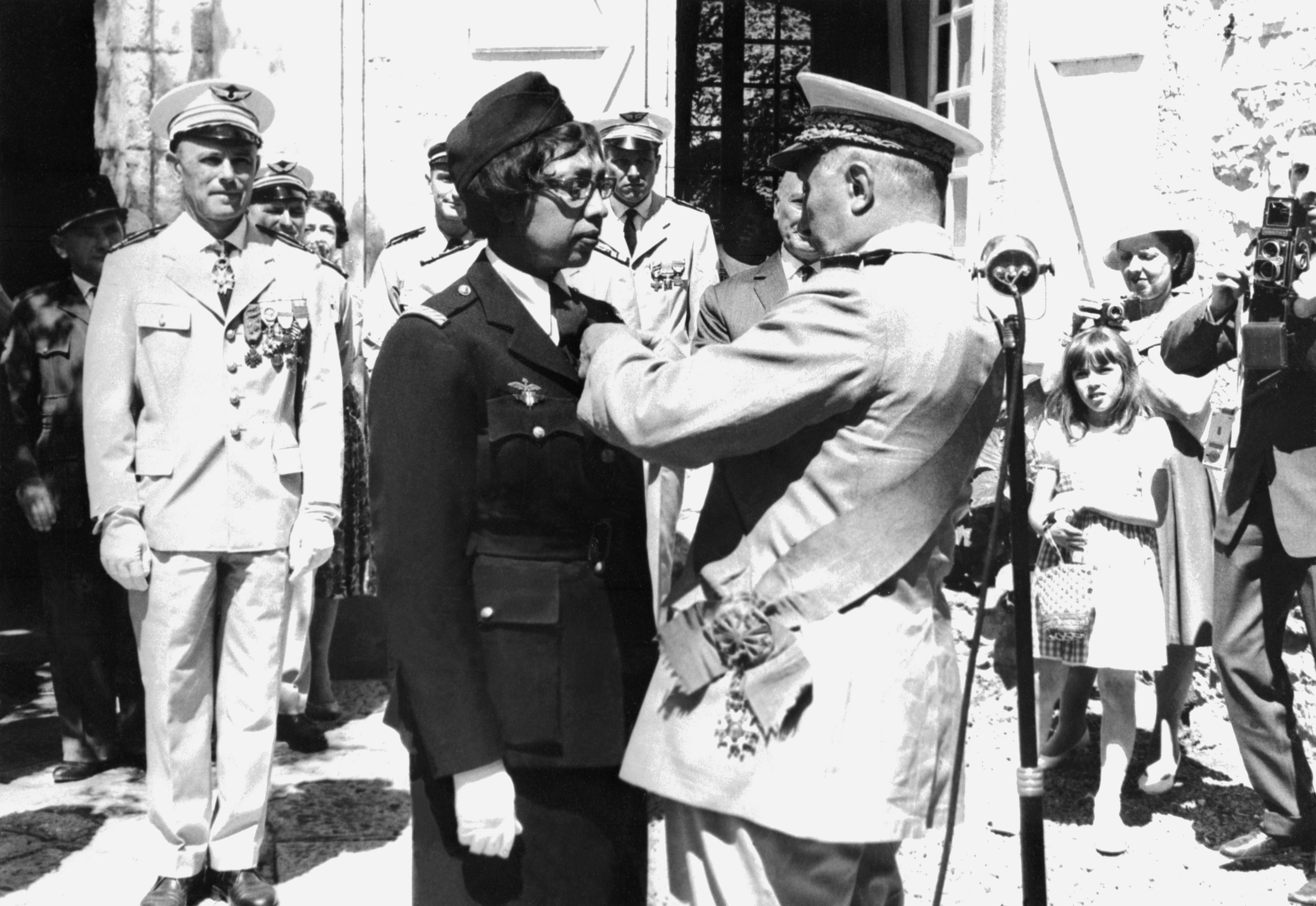 Josephine Baker receives the Croix de Guerre in 1961 in her Milandes Castle from General Martial Valin