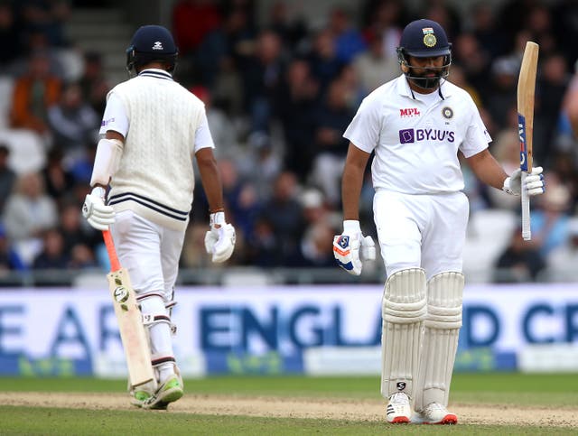 India’s Rohit Sharma (right) celebrates reaching a half century during day three of the Third Test against England at Headingley (Nigel French/PA Images).