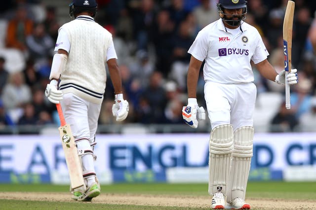 India’s Rohit Sharma (right) celebrates reaching a half century during day three of the Third Test against England at Headingley (Nigel French/PA Images).