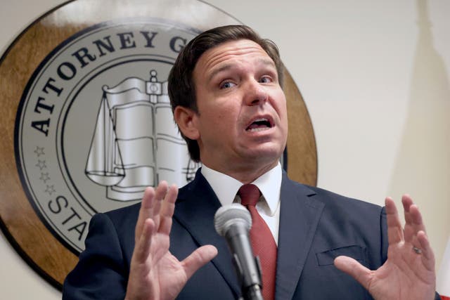 <p>Florida governor Ron DeSantis responds to a question during a press conference with Florida attorney general Ashley Moody in Orlando on Thursday </p>
