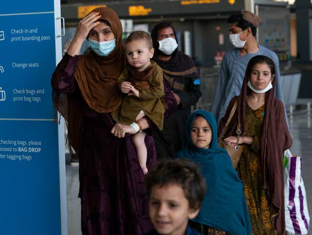 <p>Afghans arriving in Washington were among the last to leave Kabul as UK and US evacuation efforts wind down </p>