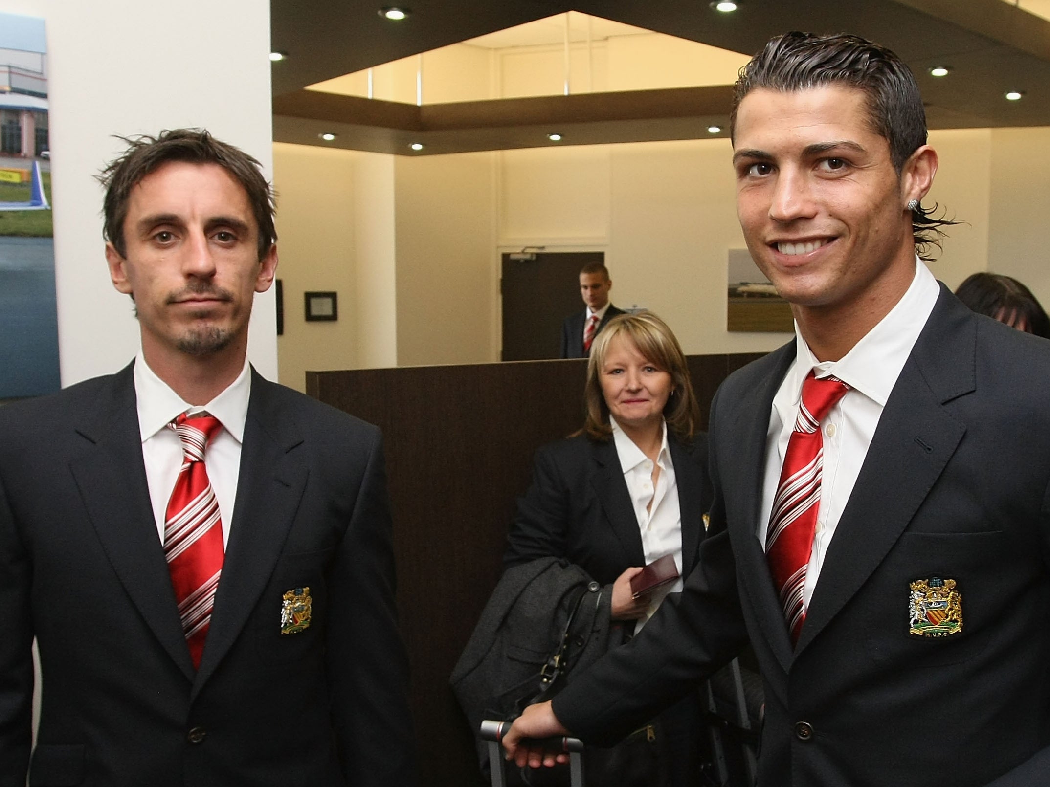 Gary Neville and Cristiano Ronaldo of Manchester United depart from Manchester Airport