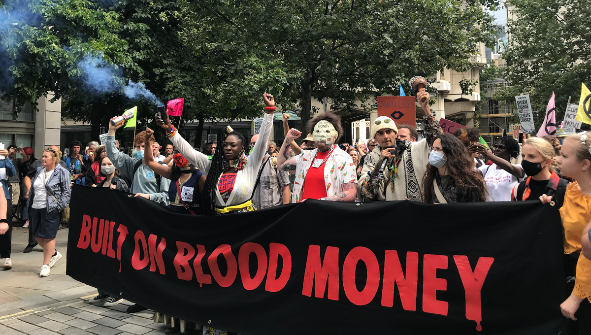 XR Blood Money March: Protesters demand systems change as paint splattered through City of London