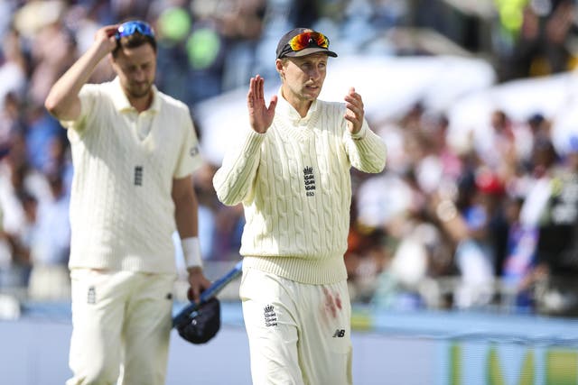 England’s Joe Root (right) claps the fans at Headingley after victory over India in the third Test with man-of-the-match Ollie Robinson alongside him (Nigel French/PA Images).