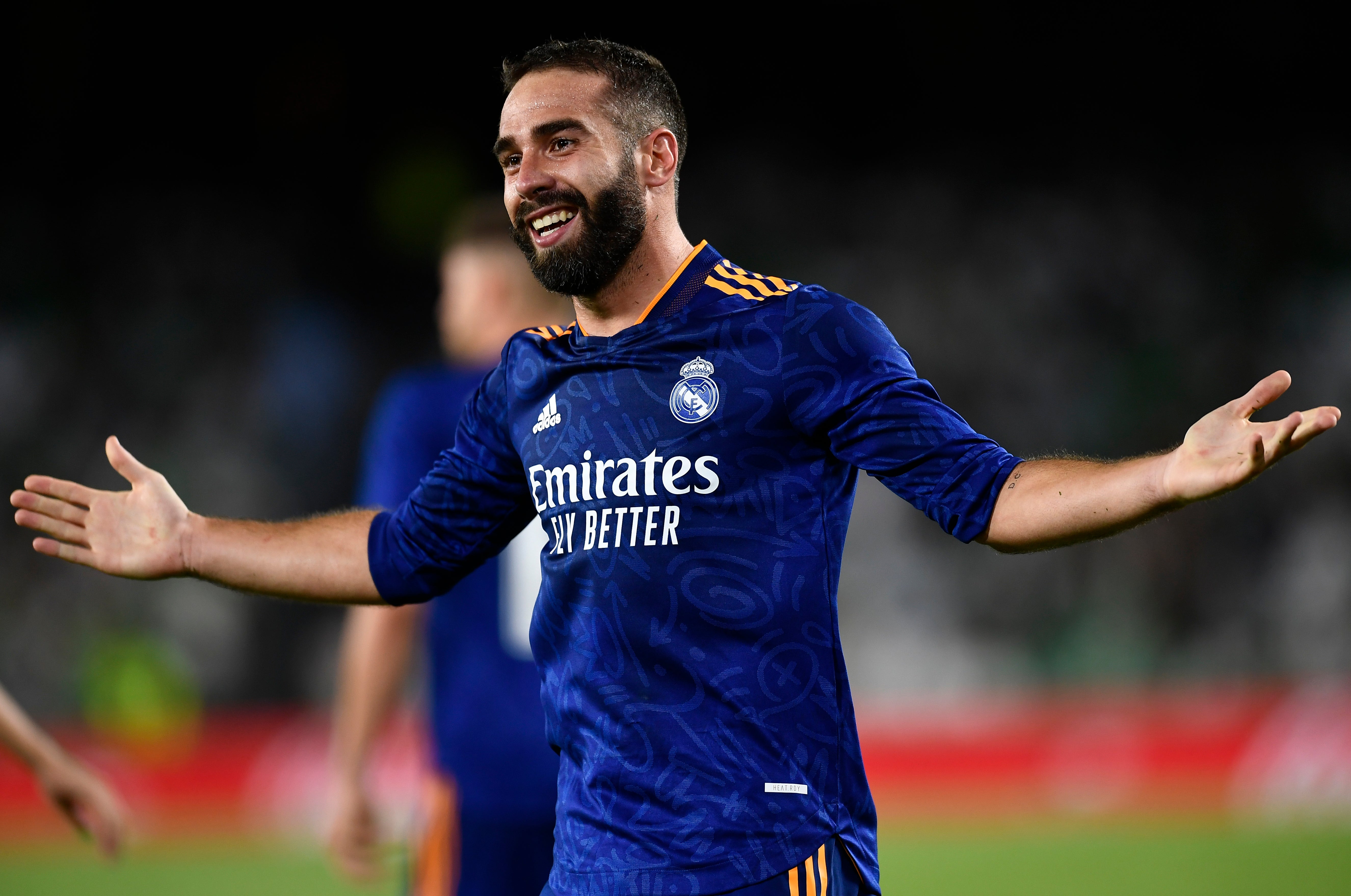  Dani Carvajal of Real Madrid celebrates after scoring a goal during a Champions League match.