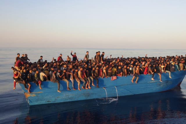 <p>The hundreds of migrants, mainly from countries in North and West Africa, were transferred to patrol boats to be brought to the port of Lampedusa</p>