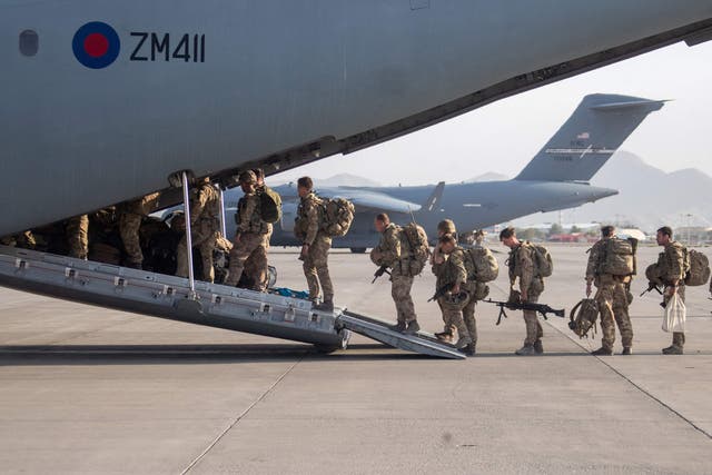 <p>British military personnel departing Kabul airport</p>
