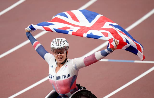 Great Britain’s Hannah Cockroft celebrates winning the Women’s 100 metres – T34 final at the Olympic Stadium during day five of the Tokyo 2020 Paralympic Games in Japan (Tim Goode/PA)