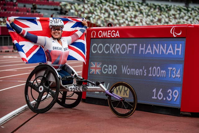 <p>Hannah Cockroft celebrates winning gold in a world record time</p>