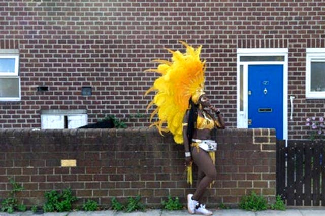<p>A costumed Notting Hill Carnival reveller in 2019</p>