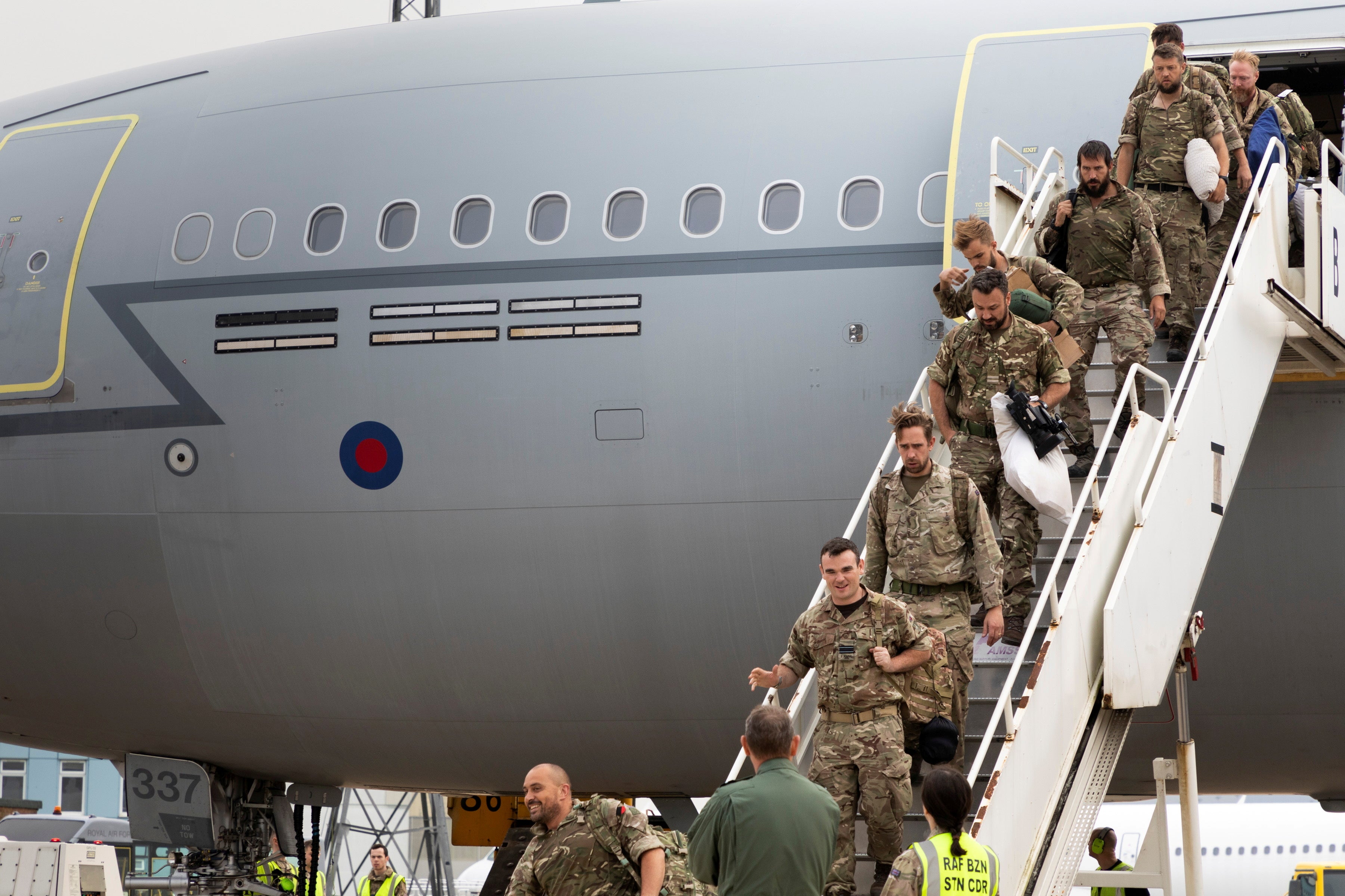 Military personnel arrive at RAF Brize Norton, in Oxford, base after being evacuated from Afghanistan