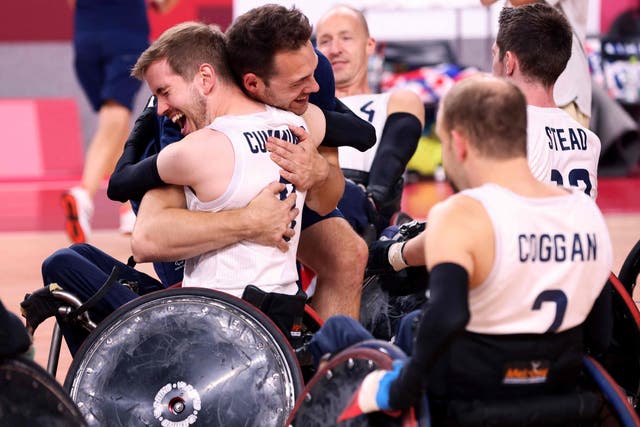 <p>Britain’s players celebrate victory in the wheelchair rugby final</p>
