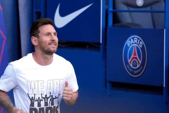 Lionel Messi made his highly-anticipated debut Paris St Germain appearance from the bench in a routine 2-0 win over Reims (Francois Mori/AP)