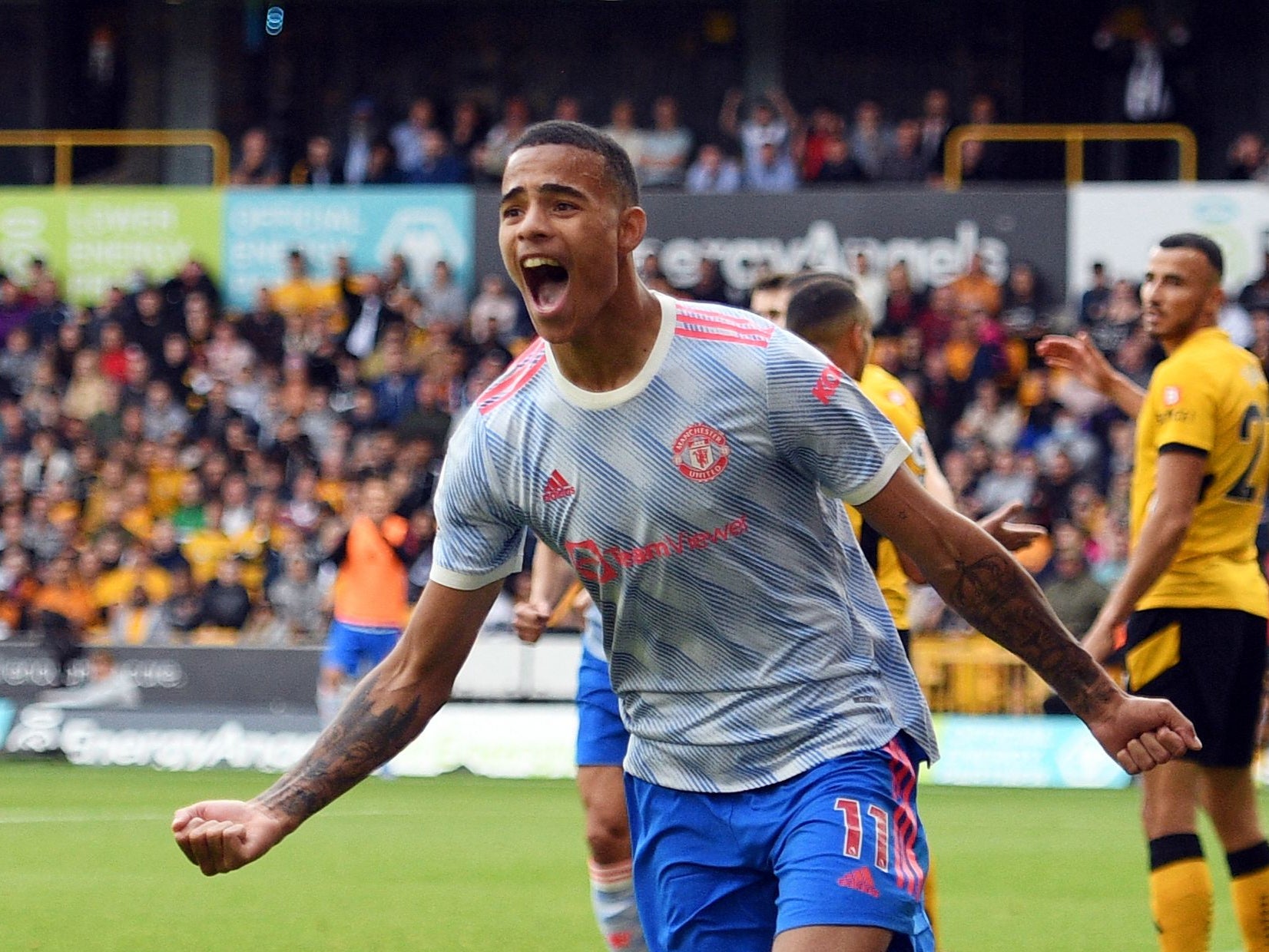 Mason Greenwood celebrates scoring at Molineux