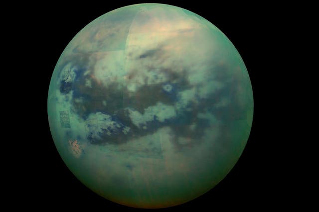 <p>File: A composite image shows an infrared view of Saturn’s moon Titan from Nasa’s Cassini spacecraft</p>